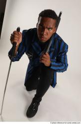 Garson KNEELING POSE WITH SHOTGUN